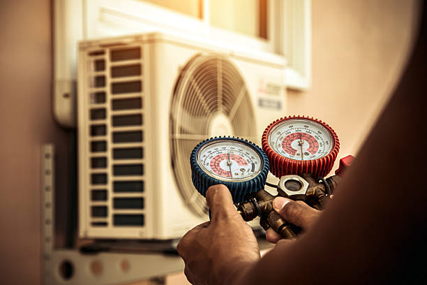 Professional Hvac technician working in North Versailles, PA